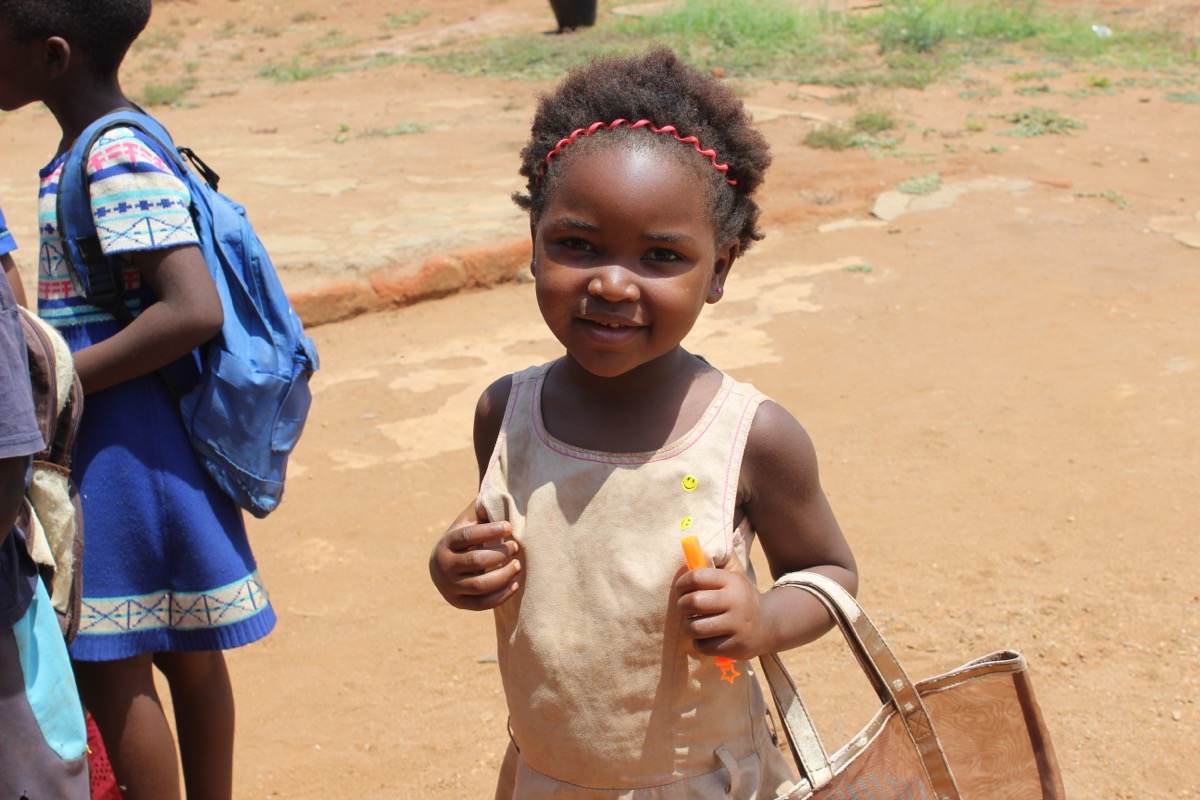 Smiling young girl with red headband